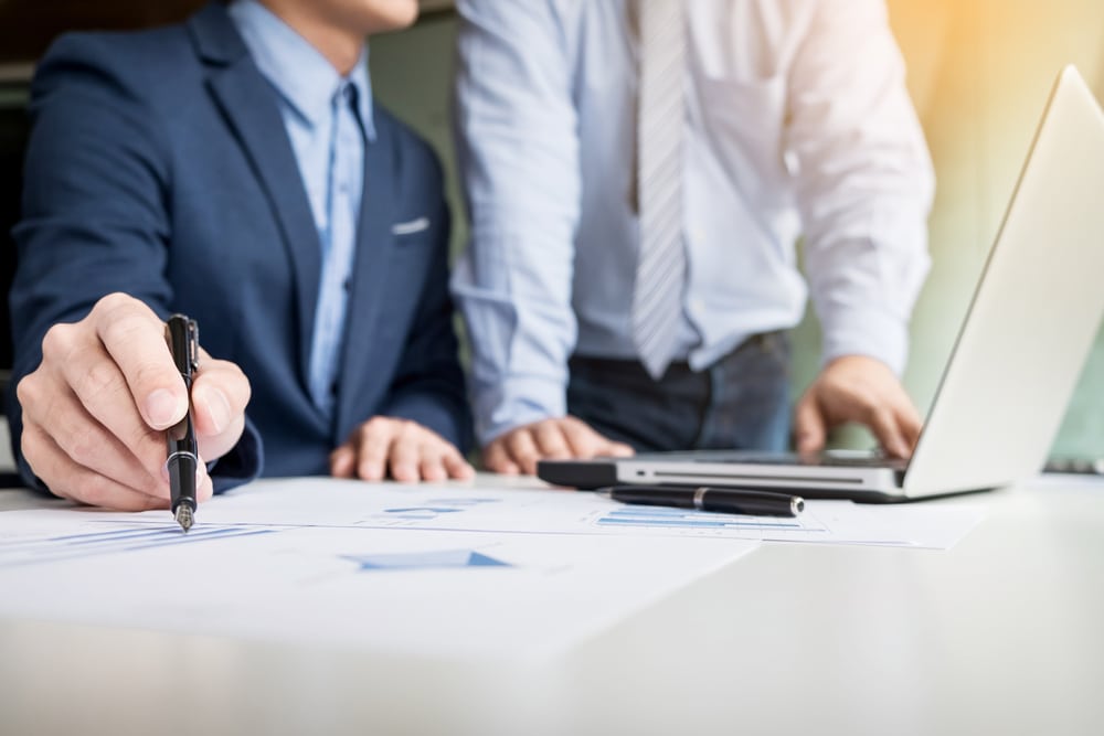 two-business-managers-working